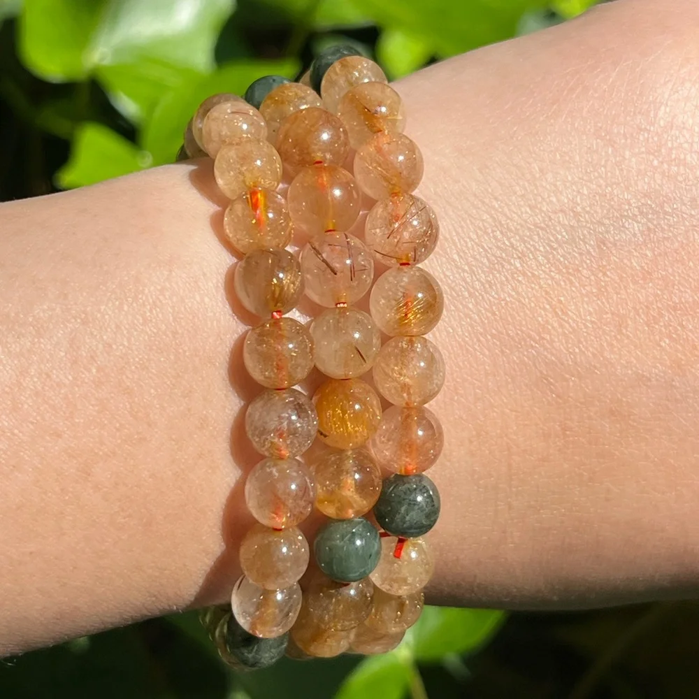 Gorgeous 8mm gold rutilated quartz bracelet‎